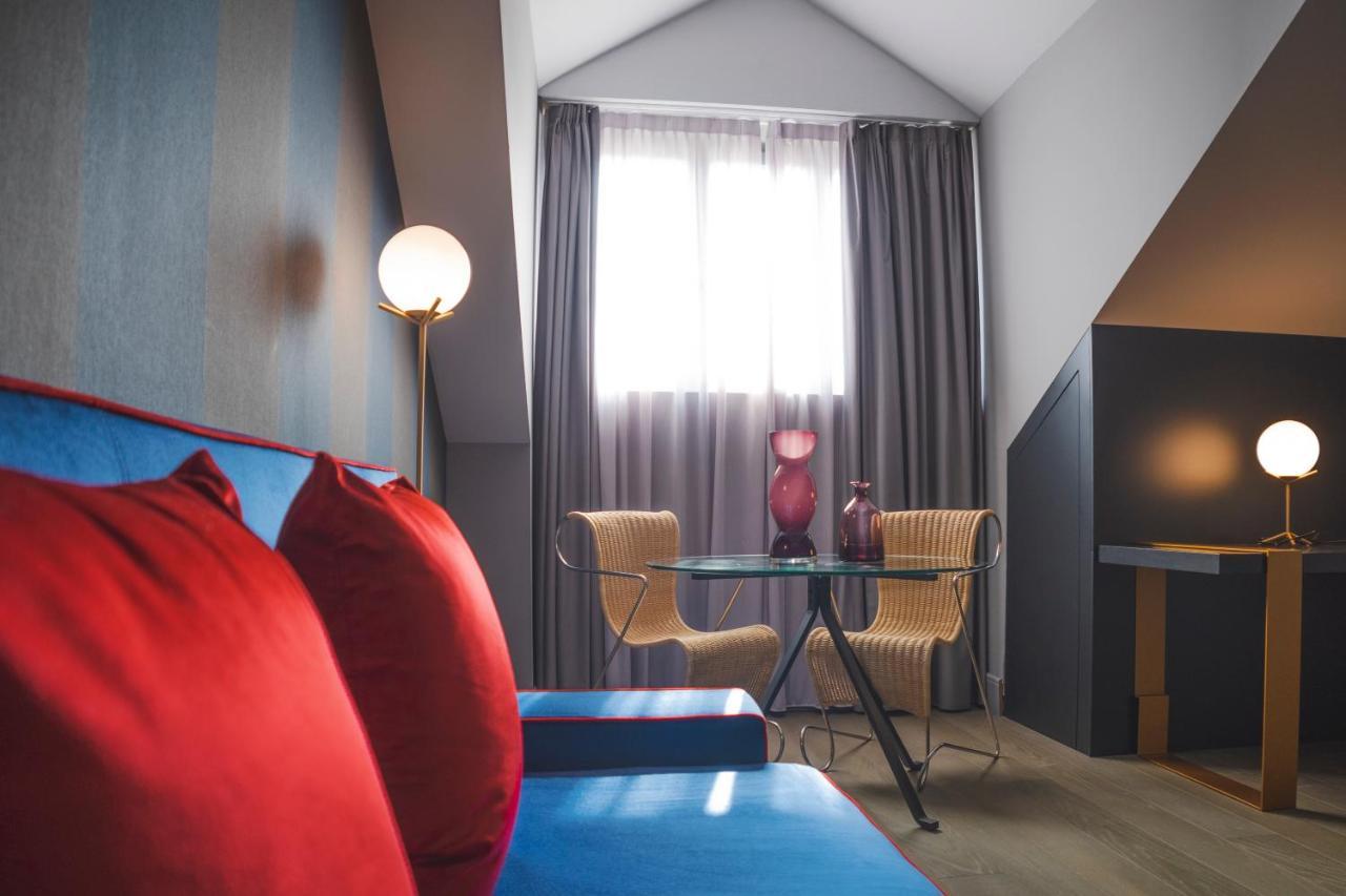 Hotel Palazzo Cornalia à Milan Extérieur photo A room at the hotel